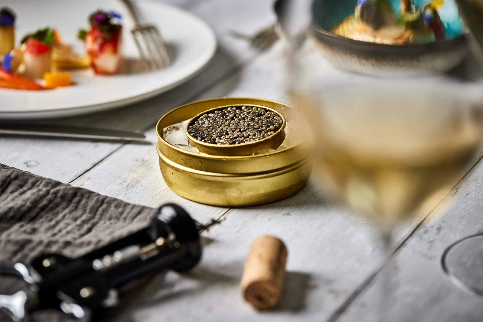 London Caviar with surrounded by lobster and wine