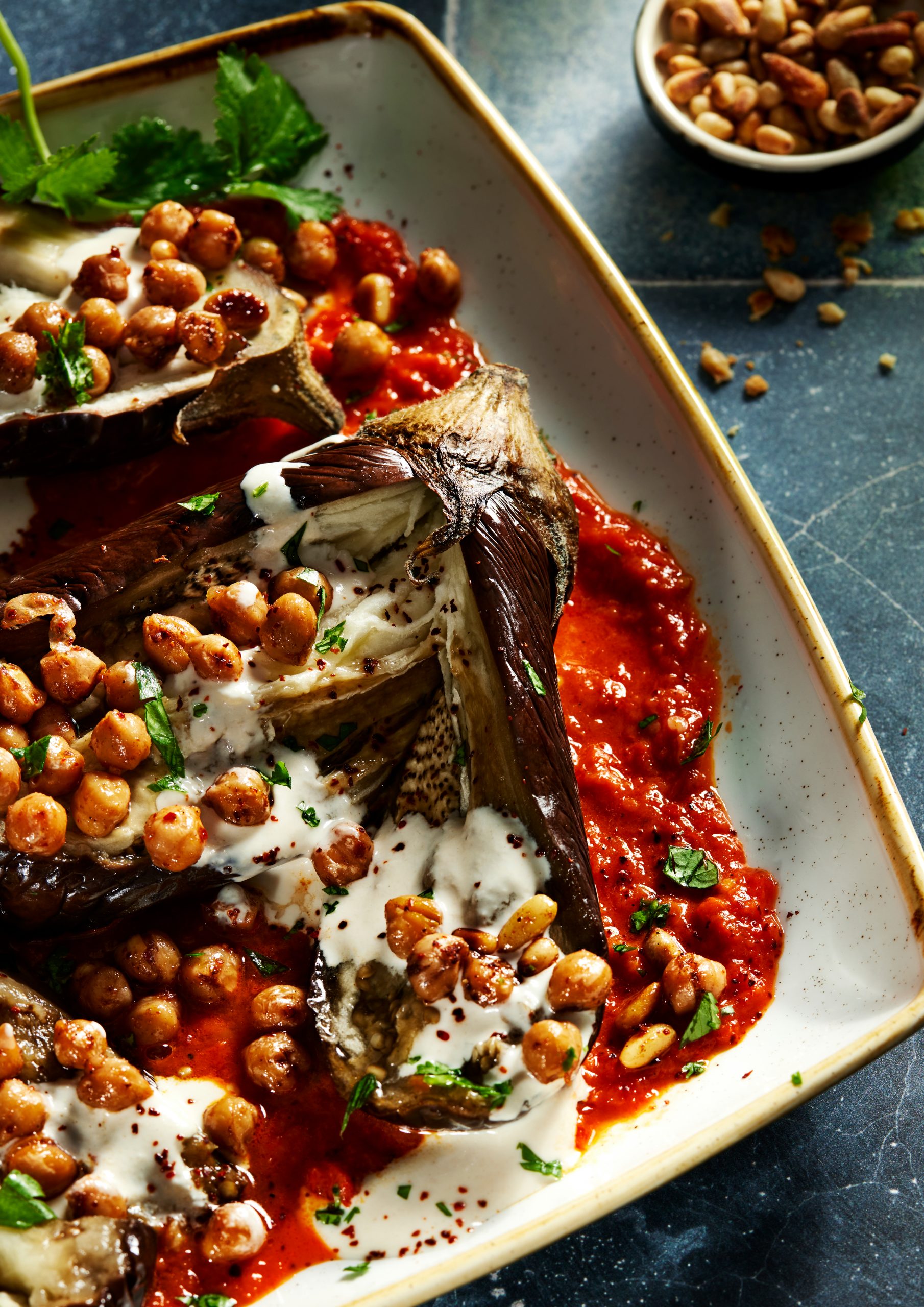 Stuffed aubergine with chickpeas and tomato sauce