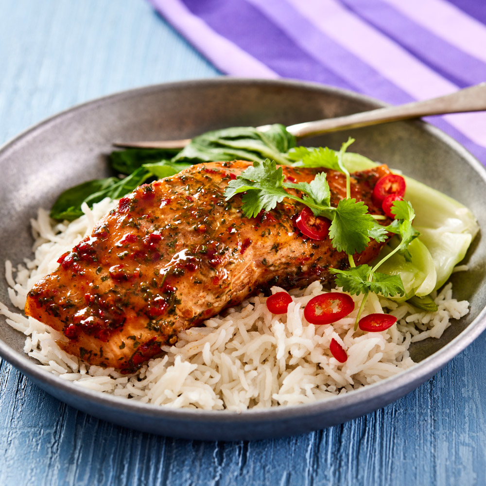 Grilled Salmon with Herb Sauce, Rice, Bok Choy, Cilantro, Chili - Vibrant and Flavorful Dish
